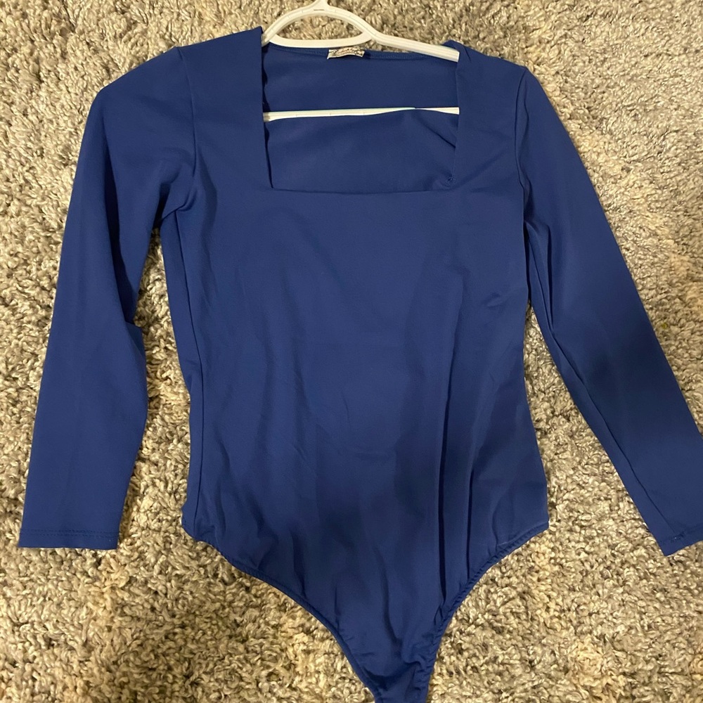Super cute free people bodysuit! So flattering on!